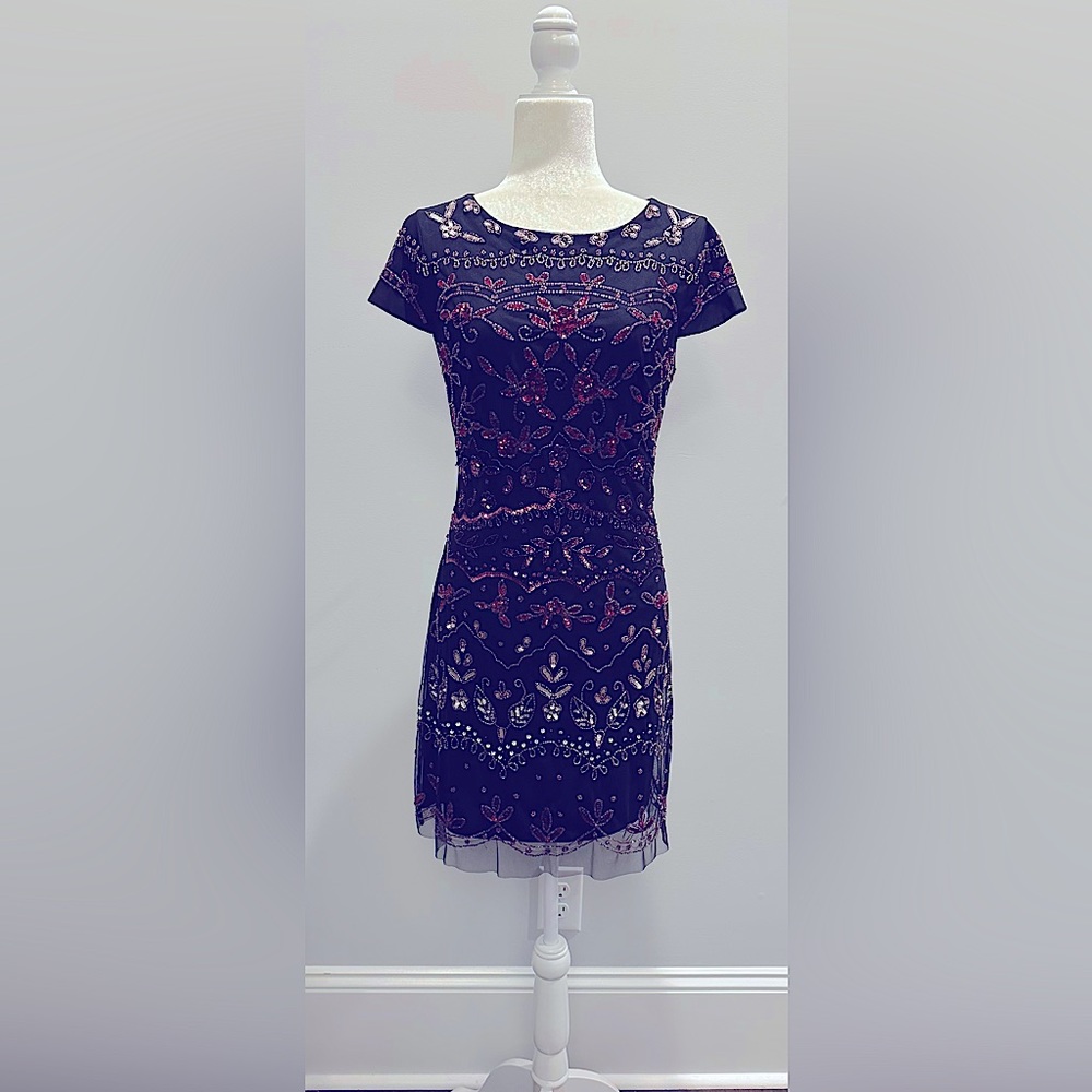 Black dress with pink sequin details